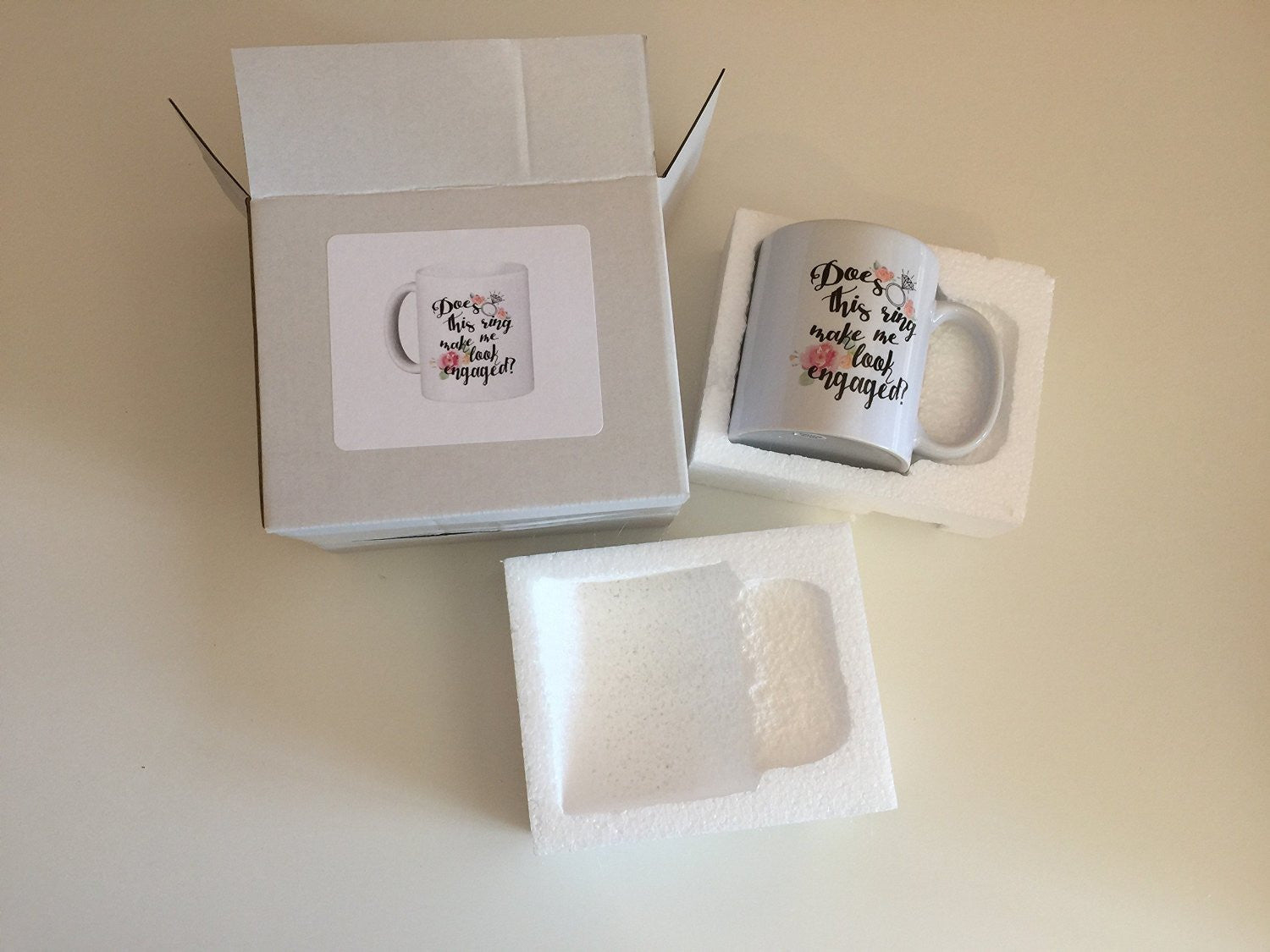 Engagement Coffee Mug Set "Does this ring make me look engaged?" and "I put a ring on it" 2 11oz Mugs In White Gift Boxes